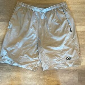 UGA Nike athletic shorts. Silver color. Size L